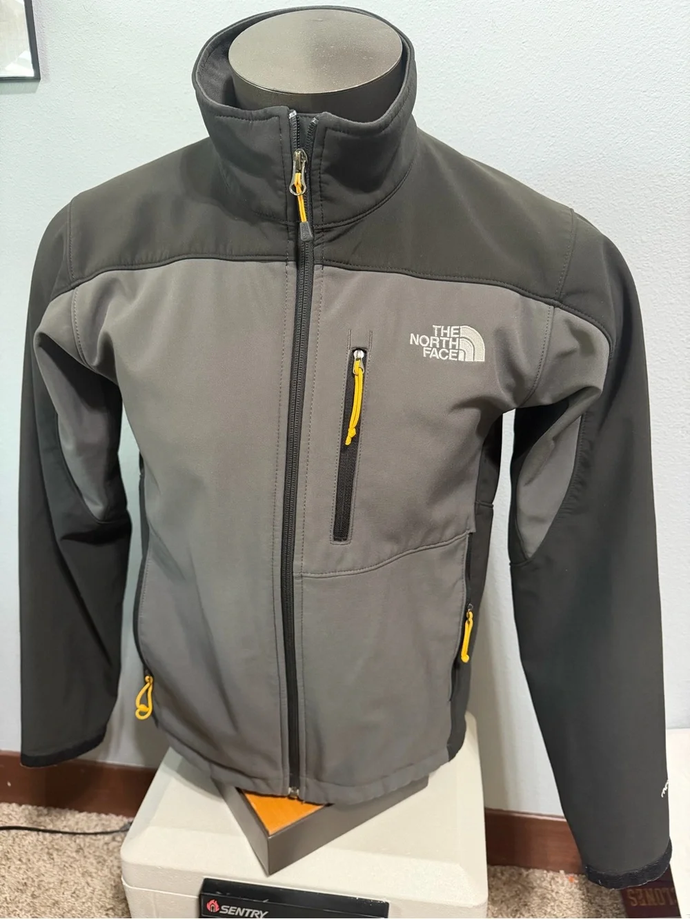 The North Face Apex Men's Grey and Black Softshell Jacket with Yellow Accents